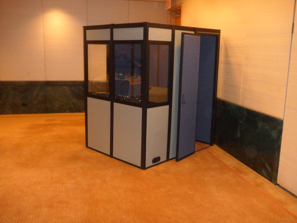 an interpreter booth that is fully enclosed